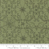 Image of the Home Sweet Haunt Webs Moss  quilting cotton fabric by Moda Fabrics. Features spiderwebs on a green background. Cute Little Fabric Shop