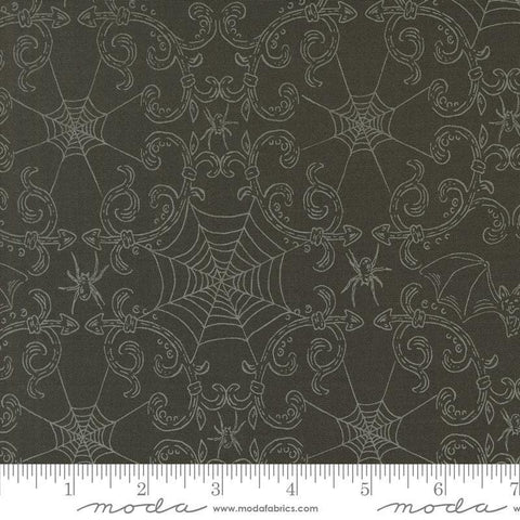 Image of the Home Sweet Haunt Webs Charcoal quilting cotton fabric by Moda Fabrics. Features spiderwebs on a black background. Cute Little Fabric Shop