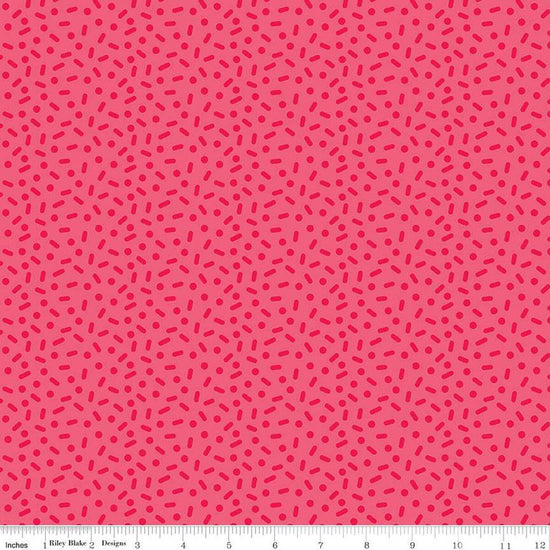 Image of the Gingerbread Kisses Sprinkles Red quilting cotton fabric. Features sprinkles on a red background. Cute Little Fabric Shop