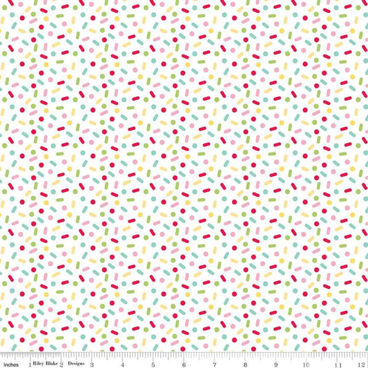Image of the Gingerbread Kisses Sprinkles Multi quilting cotton fabric. Features sprinkles on a white background. Cute Little Fabric Shop