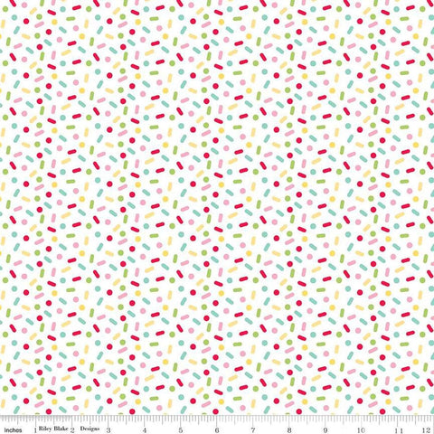 Image of the Gingerbread Kisses Sprinkles Multi quilting cotton fabric. Features sprinkles on a white background. Cute Little Fabric Shop