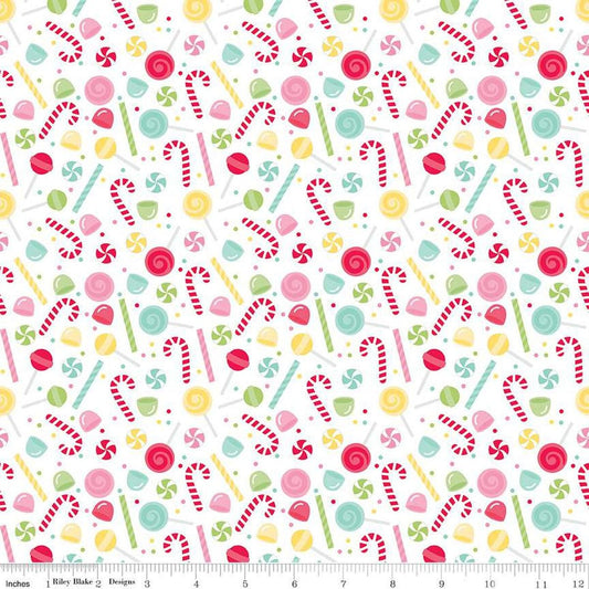 Image of the Gingerbread Kisses Sweets White quilting cotton fabric. Features candy on a white background. Cute Little Fabric Shop
