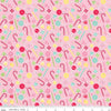 Image of the Gingerbread Kisses Sweets Pink quilting cotton fabric. Features candy on a pink background. Cute Little Fabric Shop