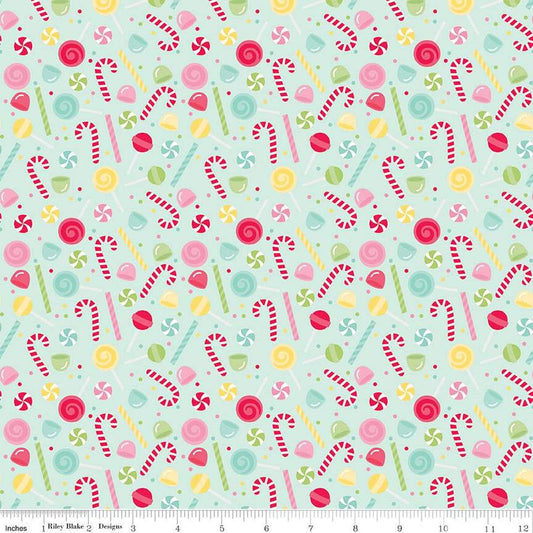 Image of the Gingerbread Kisses Sweets Blue quilting cotton fabric. Features candy on a blue background. Cute Little Fabric Shop