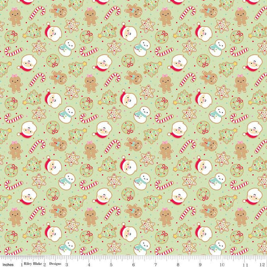 Image of the Gingerbread Kisses Sugar Cookies Green quilting cotton fabric. Features cookies on a green background. Cute Little Fabric Shop