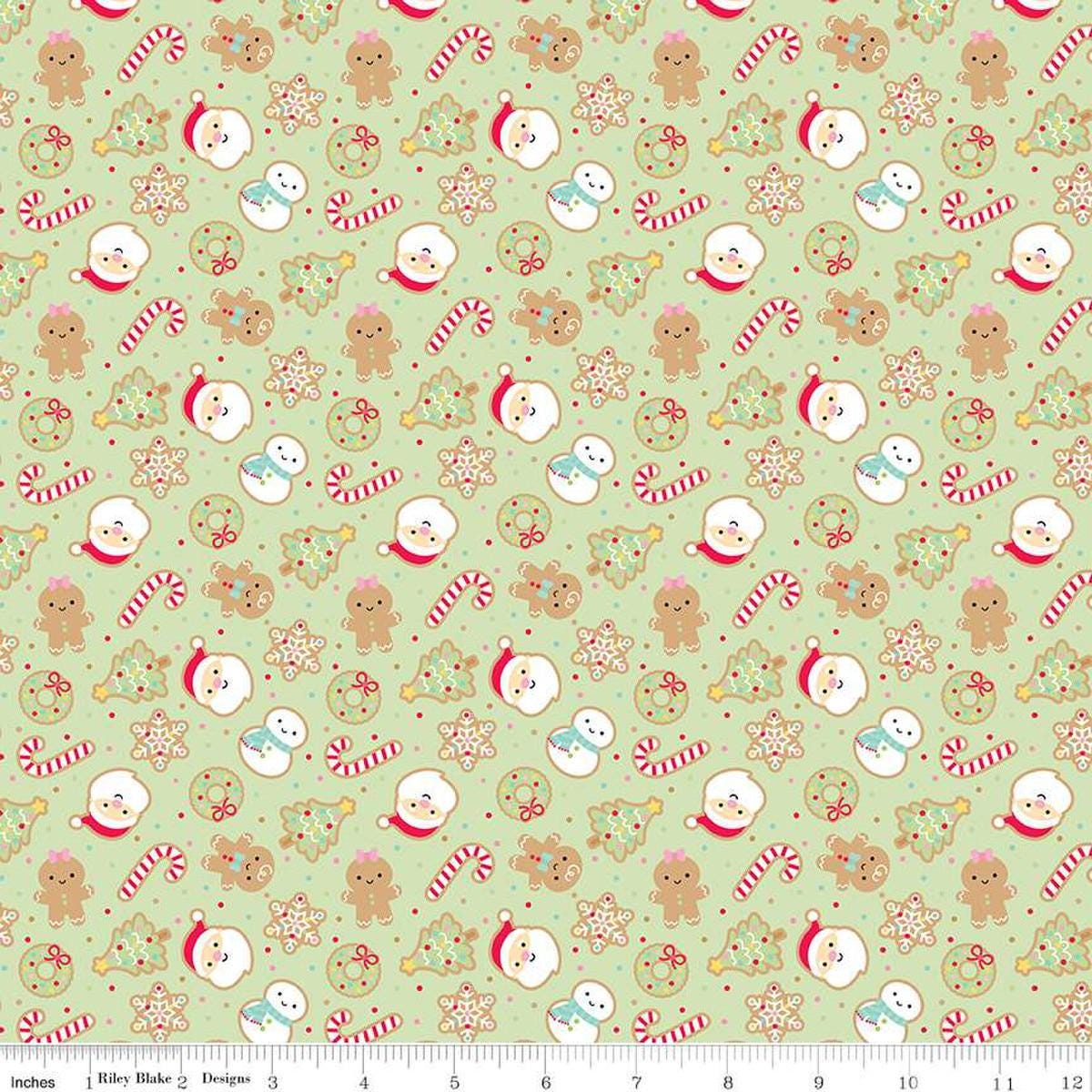 Image of the Gingerbread Kisses Sugar Cookies Green quilting cotton fabric. Features cookies on a green background. Cute Little Fabric Shop