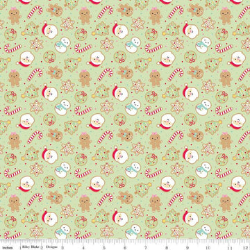 Image of the Gingerbread Kisses Sugar Cookies Green quilting cotton fabric. Features cookies on a green background. Cute Little Fabric Shop