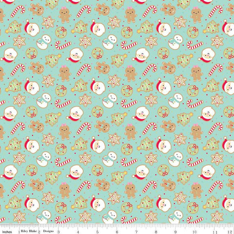 Image of the Gingerbread Kisses Sugar Cookies Blue quilting cotton fabric. Features cookies on a blue background. Cute Little Fabric Shop
