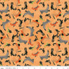Image of the Ghoul Friends Boots Toss Orange quilting cotton fabric by Teresa Kogut for Riley Blake Designs. Features boots on an orange background. Cute Little Fabric Shop