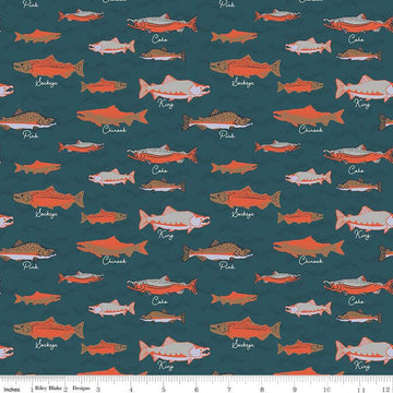 Image of the Alaska Salmon Coastal quilting cotton fabric by Riley Blake Designs. Features whales on a charcoal background. Cute Little Fabric Shop
