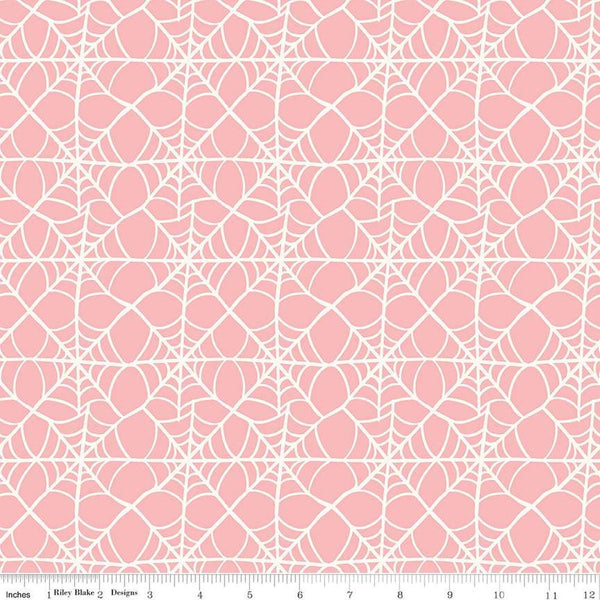 Image of the Hey Pumpkin Webs Pink quilting cotton fabric by Riley Blake Designs. Features webs on a pink background. Cute Little Fabric Shop