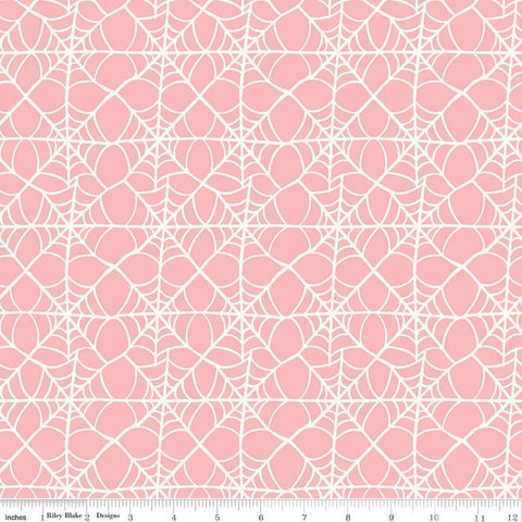 Image of the Hey Pumpkin Webs Pink quilting cotton fabric by Riley Blake Designs. Features webs on a pink background. Cute Little Fabric Shop