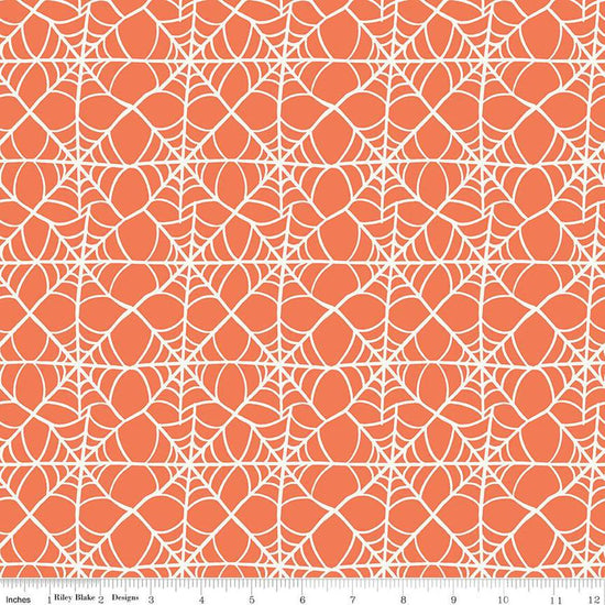 Image of the Hey Pumpkin Webs Orange quilting cotton fabric by Riley Blake Designs. Features webs on an orange background. Cute Little Fabric Shop