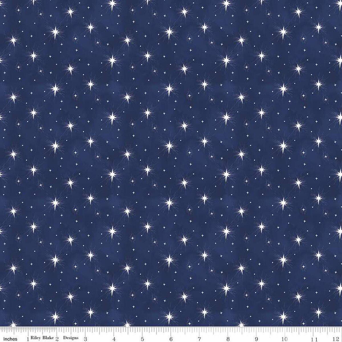 Image of the Come Let Us Adore Him Stars Navy quilting cotton fabric. Features stars on a blue background. Cute Little Fabric Shop