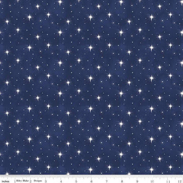 Image of the Come Let Us Adore Him Stars Navy quilting cotton fabric. Features stars on a blue background. Cute Little Fabric Shop