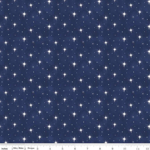 Image of the Come Let Us Adore Him Stars Navy quilting cotton fabric. Features stars on a blue background. Cute Little Fabric Shop