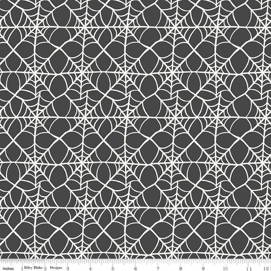 Image of the Hey Pumpkin Webs Charcoal quilting cotton fabric by Riley Blake Designs. Features webs on a black background. Cute Little Fabric Shop