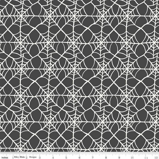 Image of the Hey Pumpkin Webs Charcoal quilting cotton fabric by Riley Blake Designs. Features webs on a black background. Cute Little Fabric Shop