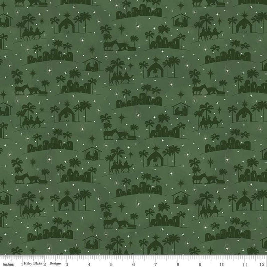 Image of the Come Let Us Adore Him Silhouettes Green quilting cotton fabric. Features nativity on a green background. Cute Little Fabric Shop