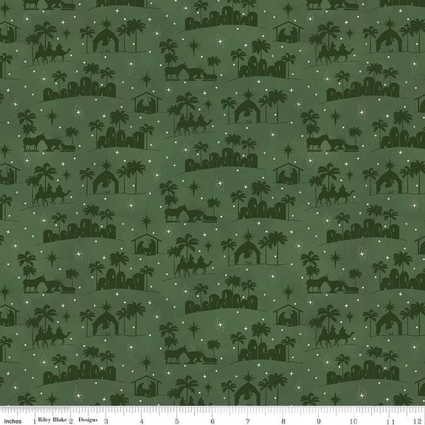 Image of the Come Let Us Adore Him Silhouettes Green quilting cotton fabric. Features nativity on a green background. Cute Little Fabric Shop