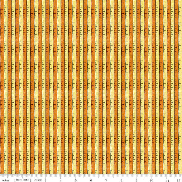Image of the Costume Maker&#39;s Act II Tape Measure Yellow quilting cotton fabric. Features rulers on an orange background. Cute Little Fabric Shop