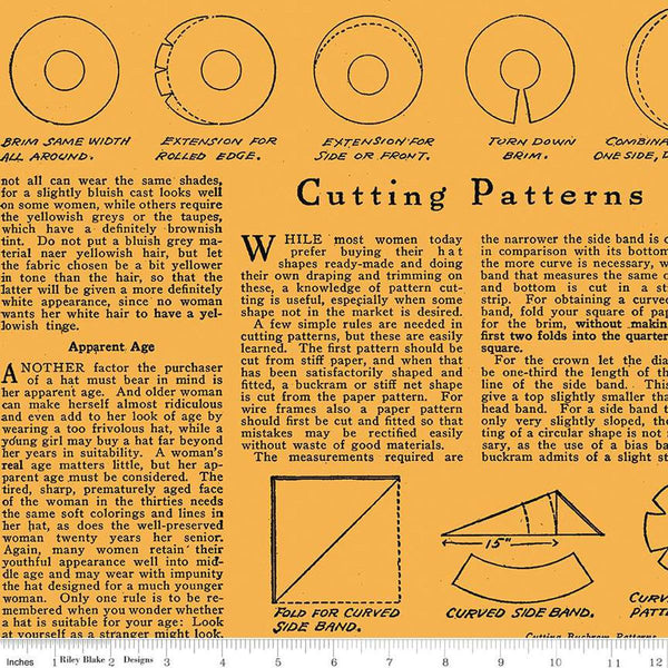 Image of the Costume Maker&#39;s Act II Hat How to Text Orange quilting cotton fabric. Features rulers on an orange background. Cute Little Fabric Shop