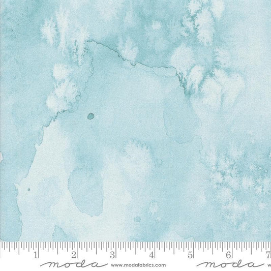 Image of the Wanderlust Flow Basics Dawn quilting cotton fabric. Features paint on a blue background. Cute Little Fabric Shop