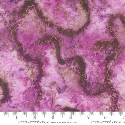 Image of the Wanderlust Geode Amethyst quilting cotton fabric. Features paint on a purple background. Cute Little Fabric Shop