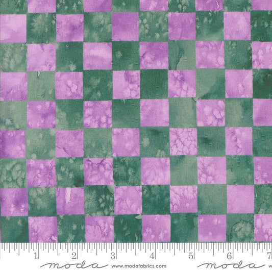 Image of the Wanderlust Checks Wisteria quilting cotton fabric. Features checks on a purple background. Cute Little Fabric Shop