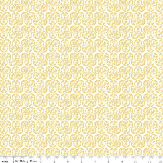 Image of the Nature's Portrait Trifolium Yellow quilting cotton fabric by Riley Blake Designs. Features leaves on a yellow background. Cute Little Fabric Shop