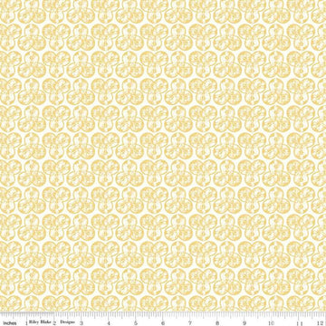 Image of the Nature's Portrait Trifolium Yellow quilting cotton fabric by Riley Blake Designs. Features leaves on a yellow background. Cute Little Fabric Shop