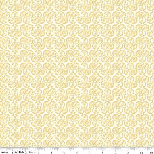 Image of the Nature's Portrait Trifolium Yellow quilting cotton fabric by Riley Blake Designs. Features leaves on a yellow background. Cute Little Fabric Shop