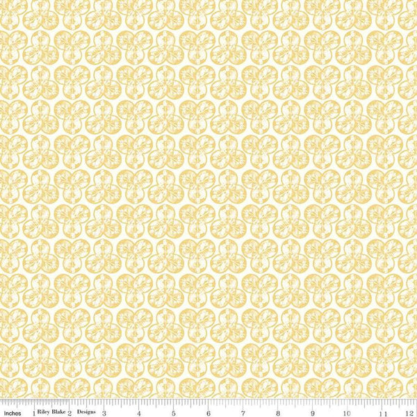 Image of the Nature&#39;s Portrait Trifolium Yellow quilting cotton fabric by Riley Blake Designs. Features leaves on a yellow background. Cute Little Fabric Shop
