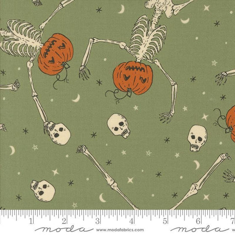 Image of the Home Sweet Haunt Skeleton Moss quilting cotton fabric by Moda Fabrics. Features skeletons on a green background. Cute Little Fabric Shop