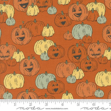 Image of the Home Sweet Haunt Pumpkins Rust quilting cotton fabric by Moda Fabrics. Features pumpkins on an orange background. Cute Little Fabric Shop