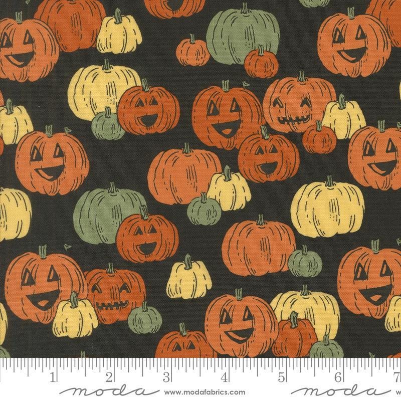 Image of the Home Sweet Haunt Pumpkins Midnight quilting cotton fabric by Moda Fabrics. Features pumpkins on a navy blue background. Cute Little Fabric Shop