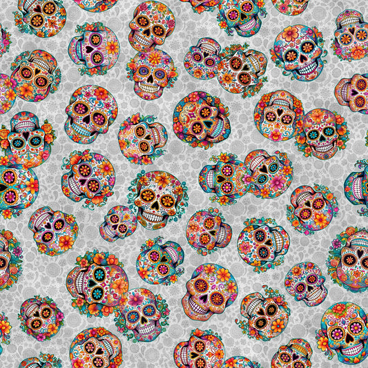 Image of the Skullduggery Sugar Skulls Toss Gray quilting cotton fabric by Morris Creative Group by QT Fabrics. Features skulls on a gray background. Cute Little Fabric Shop