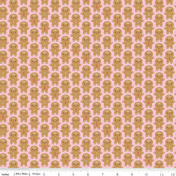 Image of the Gingerbread Kisses Gingerbread Men Pink quilting cotton fabric. Features gingerbread men on a pink background. Cute Little Fabric Shop