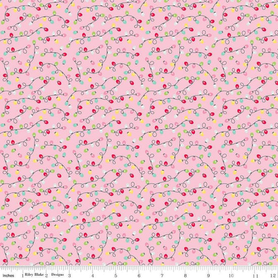 Image of the Gingerbread Kisses Lights Pink quilting cotton fabric. Features lights on a pink background. Cute Little Fabric Shop