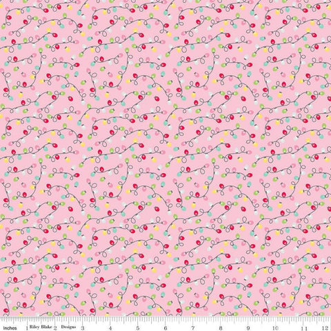 Image of the Gingerbread Kisses Lights Pink quilting cotton fabric. Features lights on a pink background. Cute Little Fabric Shop