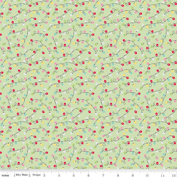 Image of the Gingerbread Kisses Lights Green quilting cotton fabric. Features lights on a green background. Cute Little Fabric Shop