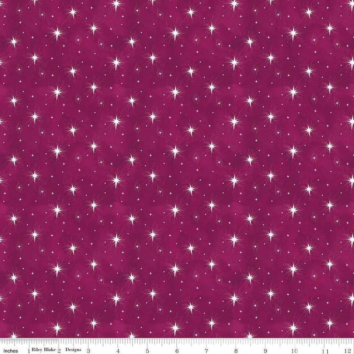 Image of the Come Let Us Adore Him Stars Wine quilting cotton fabric. Features stars on a burgundy background. Cute Little Fabric Shop