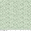 Image of the Nature's Portrait Trifolium Sage quilting cotton fabric by Riley Blake Designs. Features leaves on a green background. Cute Little Fabric Shop