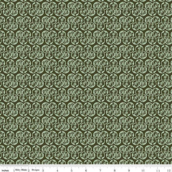 Image of the Nature's Portrait Trifolium Hunter quilting cotton fabric by Riley Blake Designs. Features leaves on a green background. Cute Little Fabric Shop