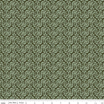 Image of the Nature's Portrait Trifolium Hunter quilting cotton fabric by Riley Blake Designs. Features leaves on a green background. Cute Little Fabric Shop