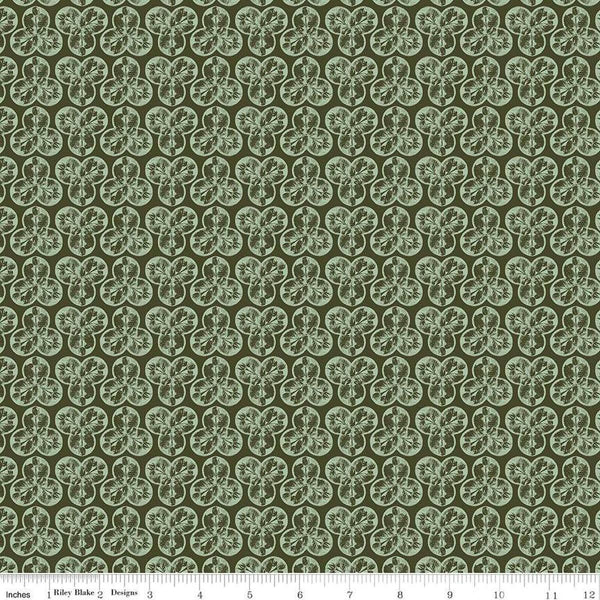 Image of the Nature&#39;s Portrait Trifolium Hunter quilting cotton fabric by Riley Blake Designs. Features leaves on a green background. Cute Little Fabric Shop