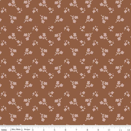 Image of the Honey Locust Saddle Saddle quilting cotton fabric by Riley Blake Designs. Features flowers on a yellow background.