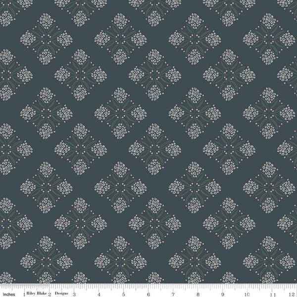 Image of the Honey Locust Alyssum Lead quilting cotton fabric by Riley Blake Designs. Features flowers on a gray background.