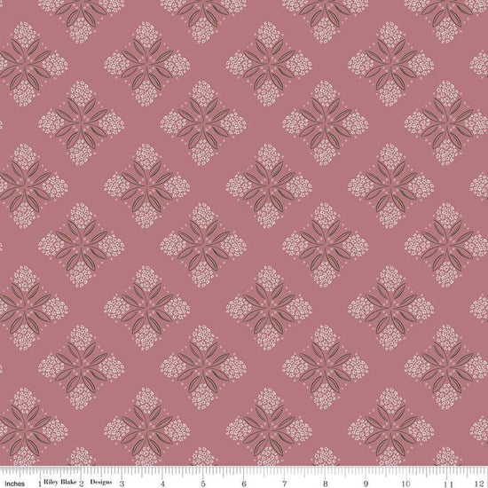 Image of the Honey Locust Alyssum Berry quilting cotton fabric by Riley Blake Designs. Features flowers on a pink background