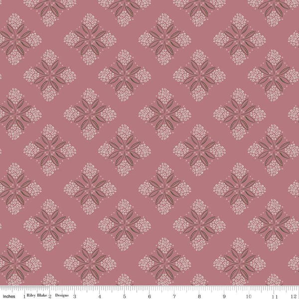 Image of the Honey Locust Alyssum Berry quilting cotton fabric by Riley Blake Designs. Features flowers on a pink background